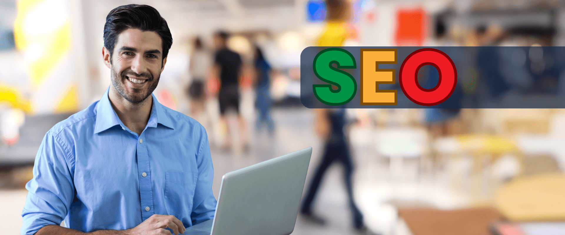 A man smiling while holding a laptop, with colourful SEO text displayed beside him.